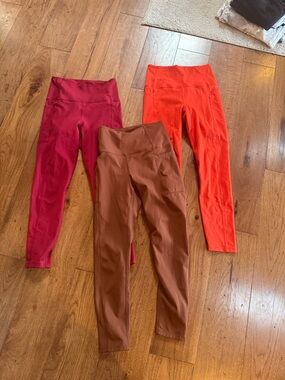 Carbon women’s ' High-Waist Leggings in Berry, Rust, and Brick Red